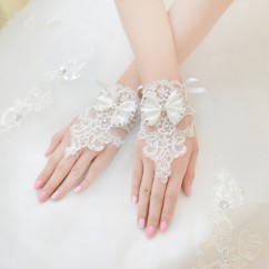 Gants de mariée avec nœud-papillon en couleur crème 